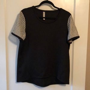 Mural Tee w/ faux leather cut out sleeves - size M
